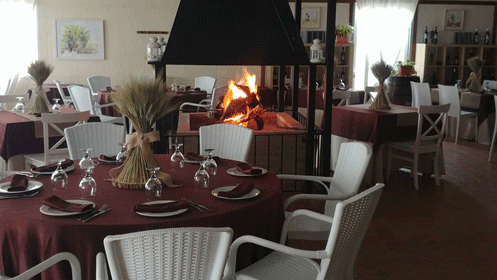 Menú de arroz a la leña con entrantes, postre y bebida.